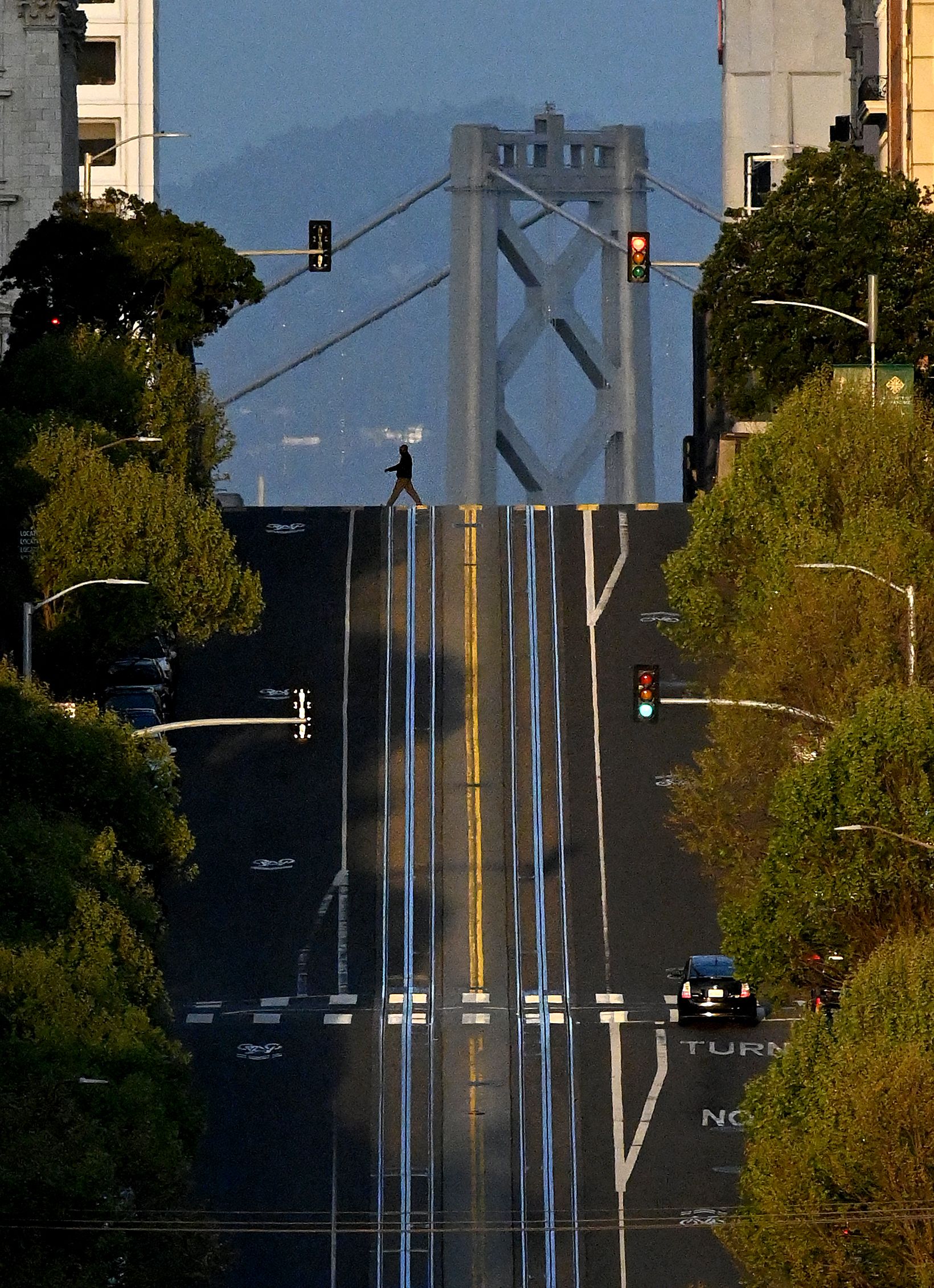  A street in San Francisco, California is pictured mostly empty as people stay home to limit virus spread